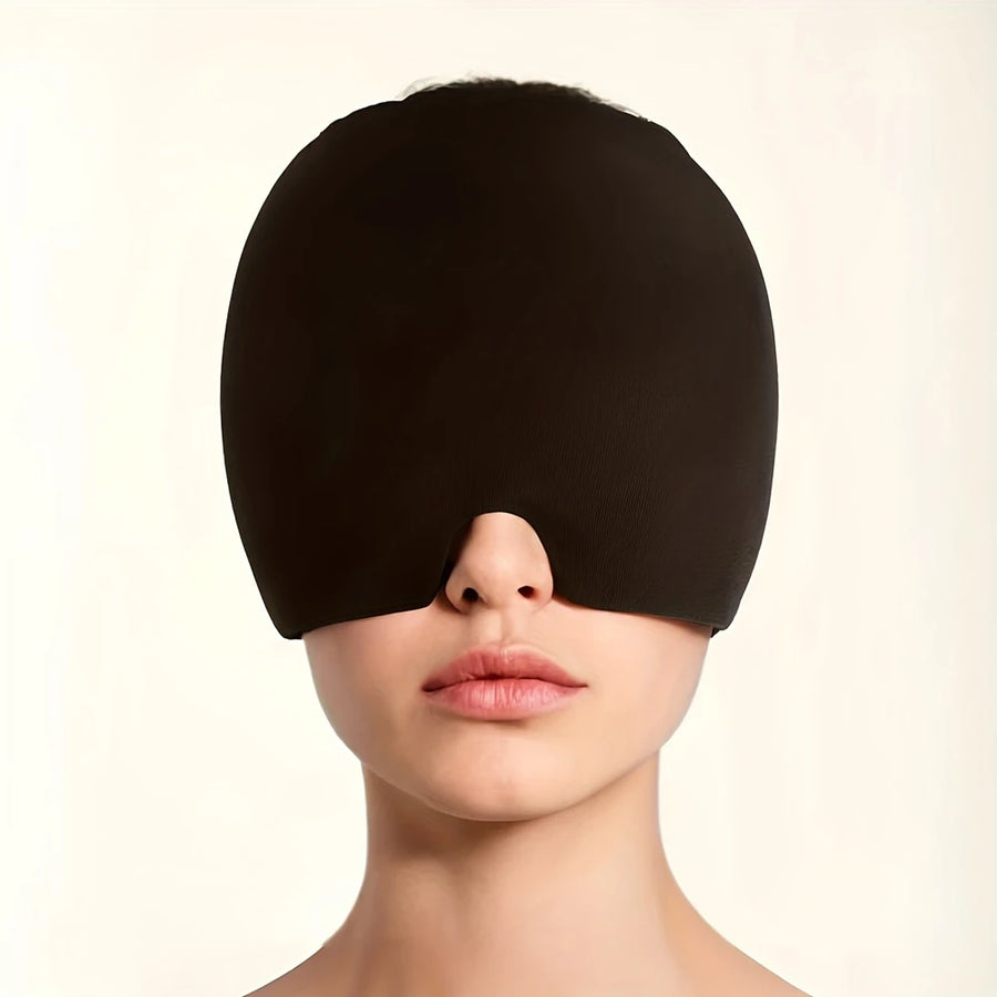 Migraine relief cap in black, worn